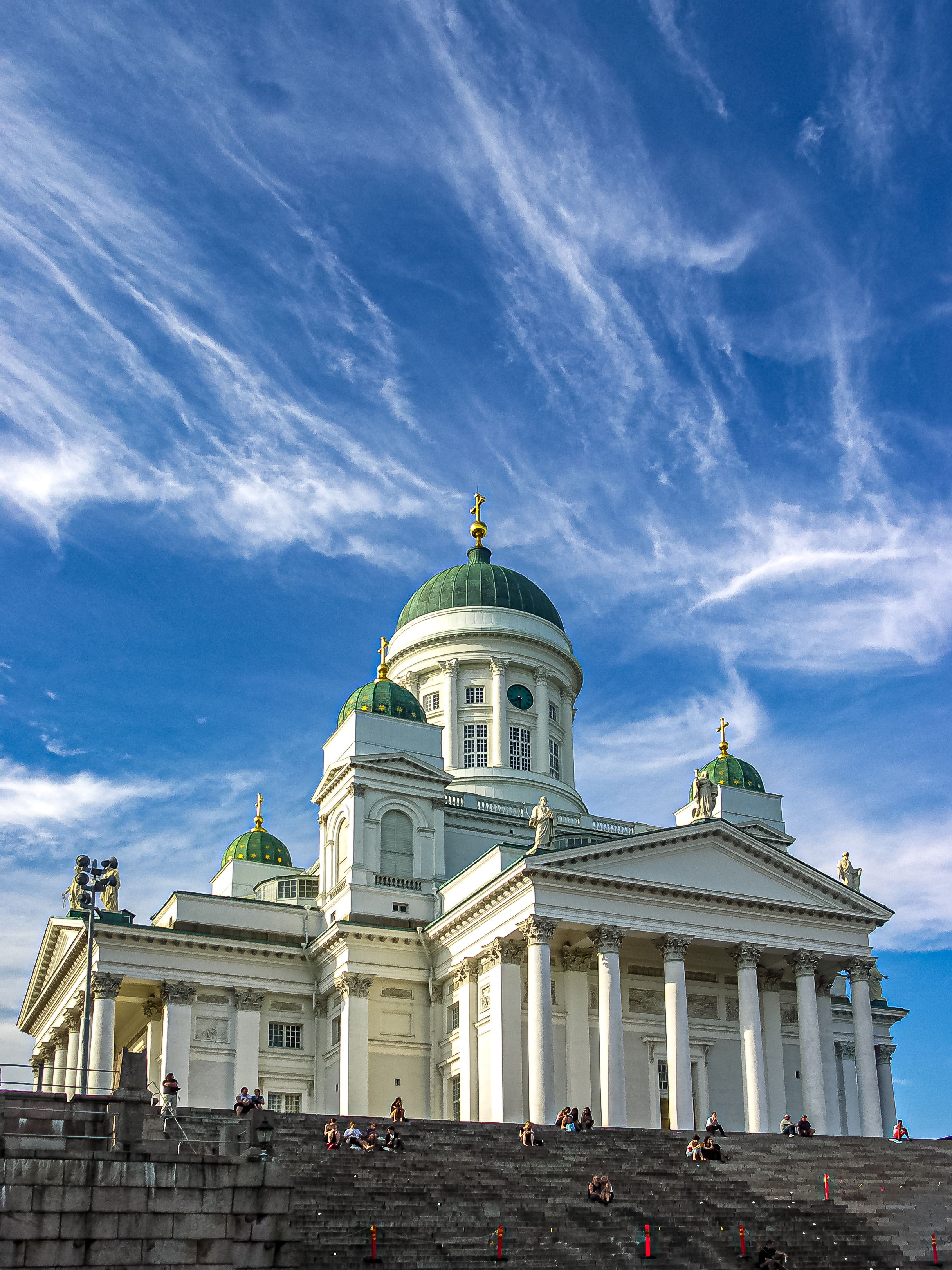 Helsinki Cathedral’s white façade and green domes above Senate Square
