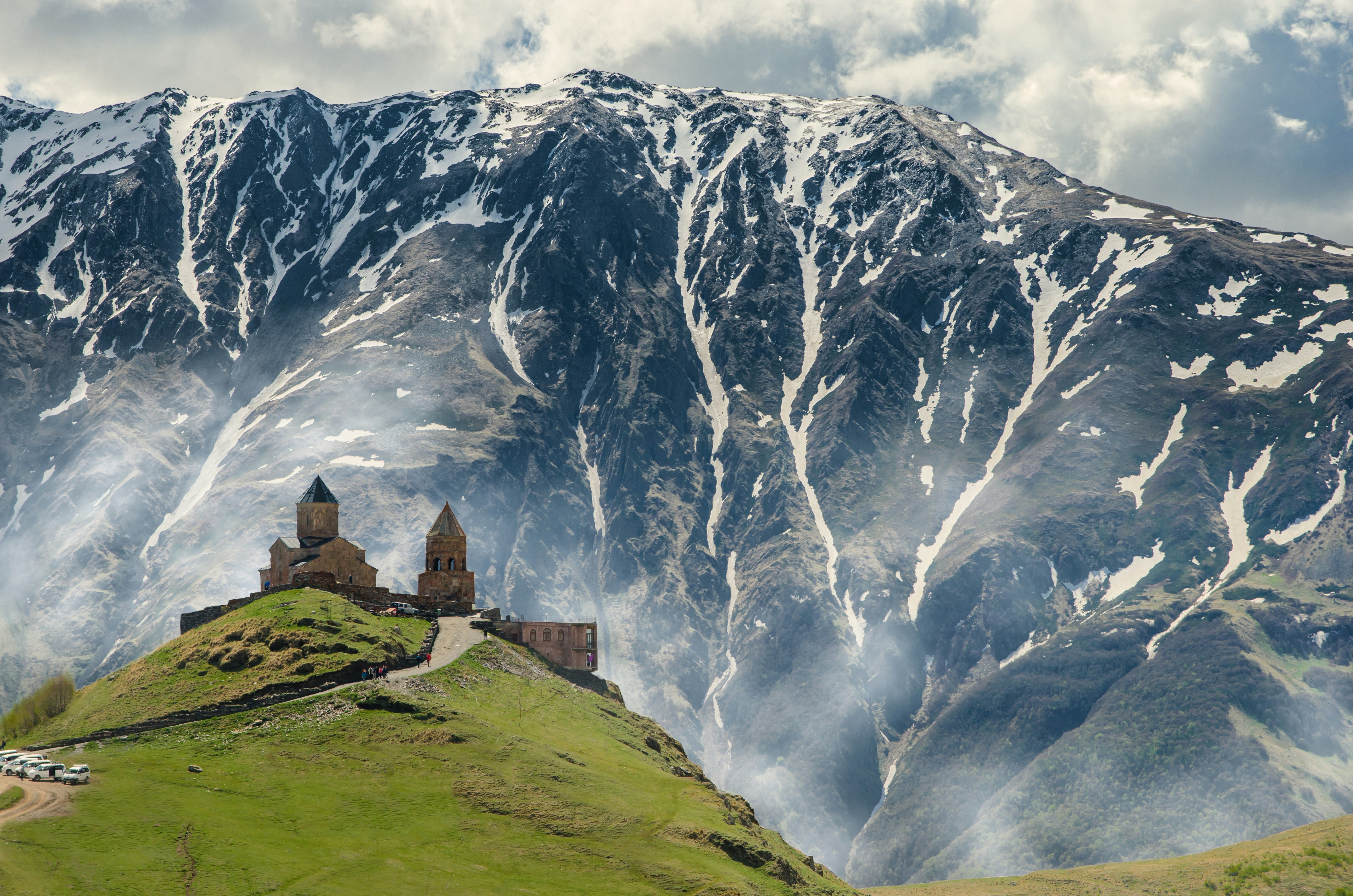 Gergeti Trinity Church beneath the Caucasus mountains