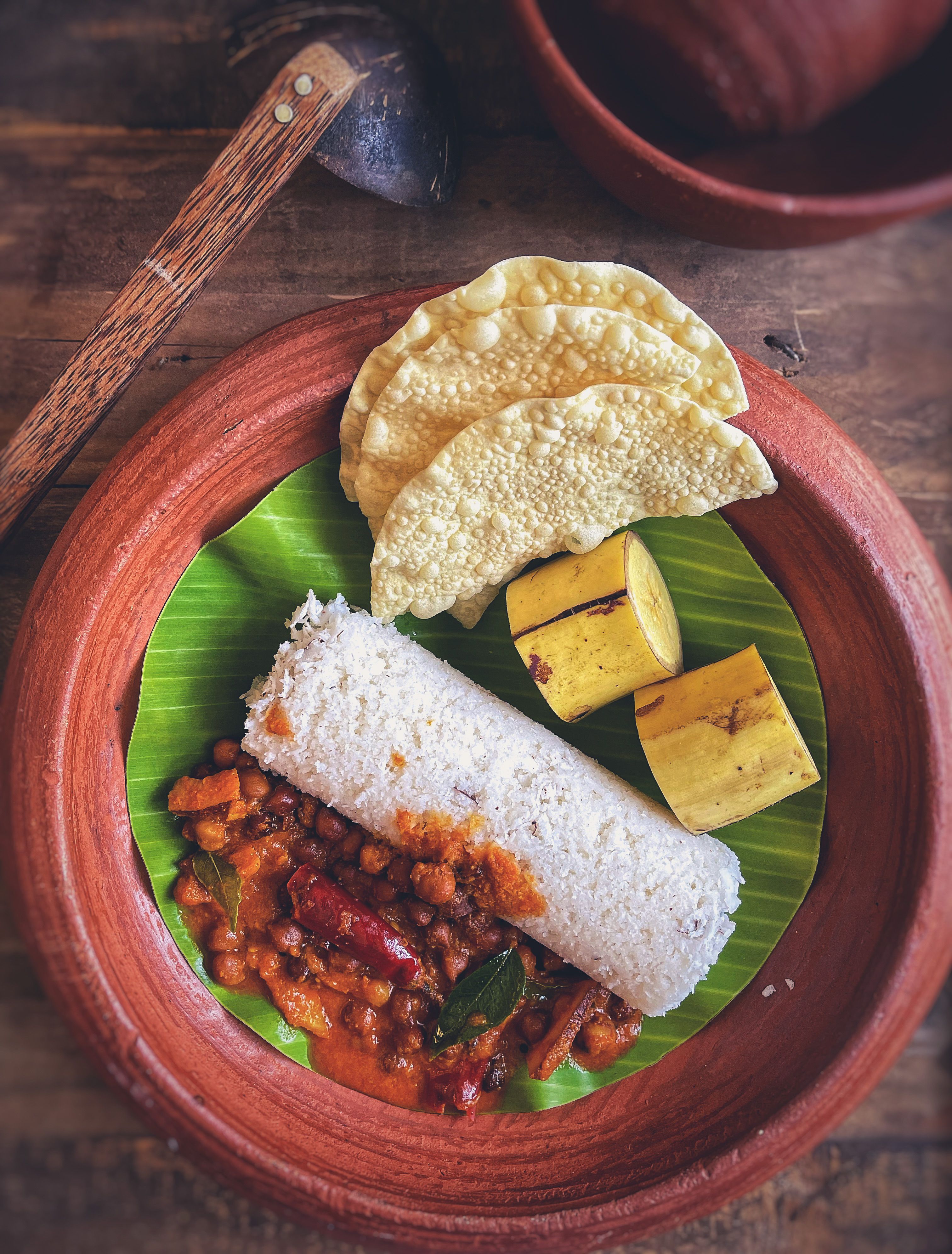 Sri Lankan meal with curries served on a banana leaf