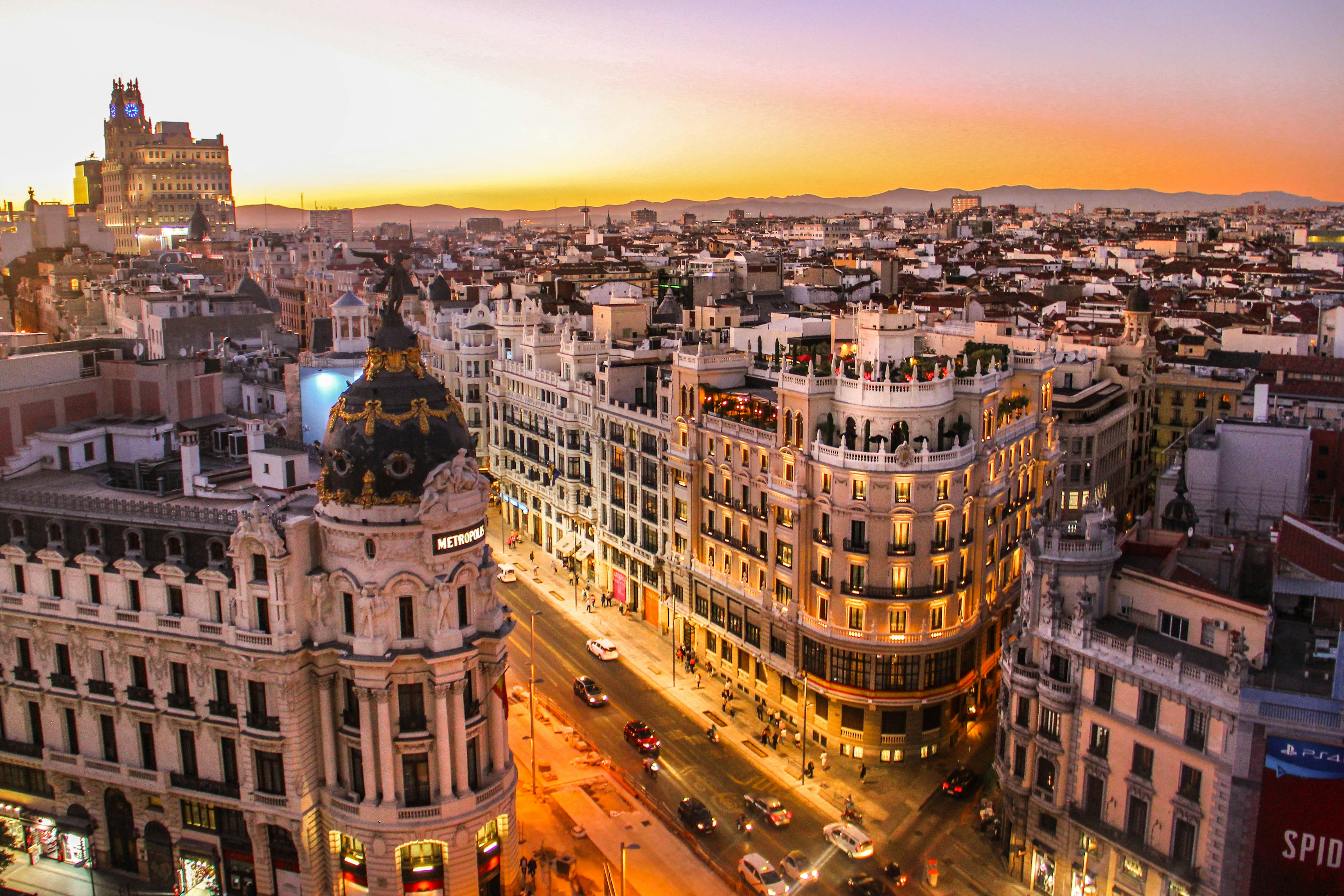 Madrid’s Gran Vía and surrounding rooftops at dusk.