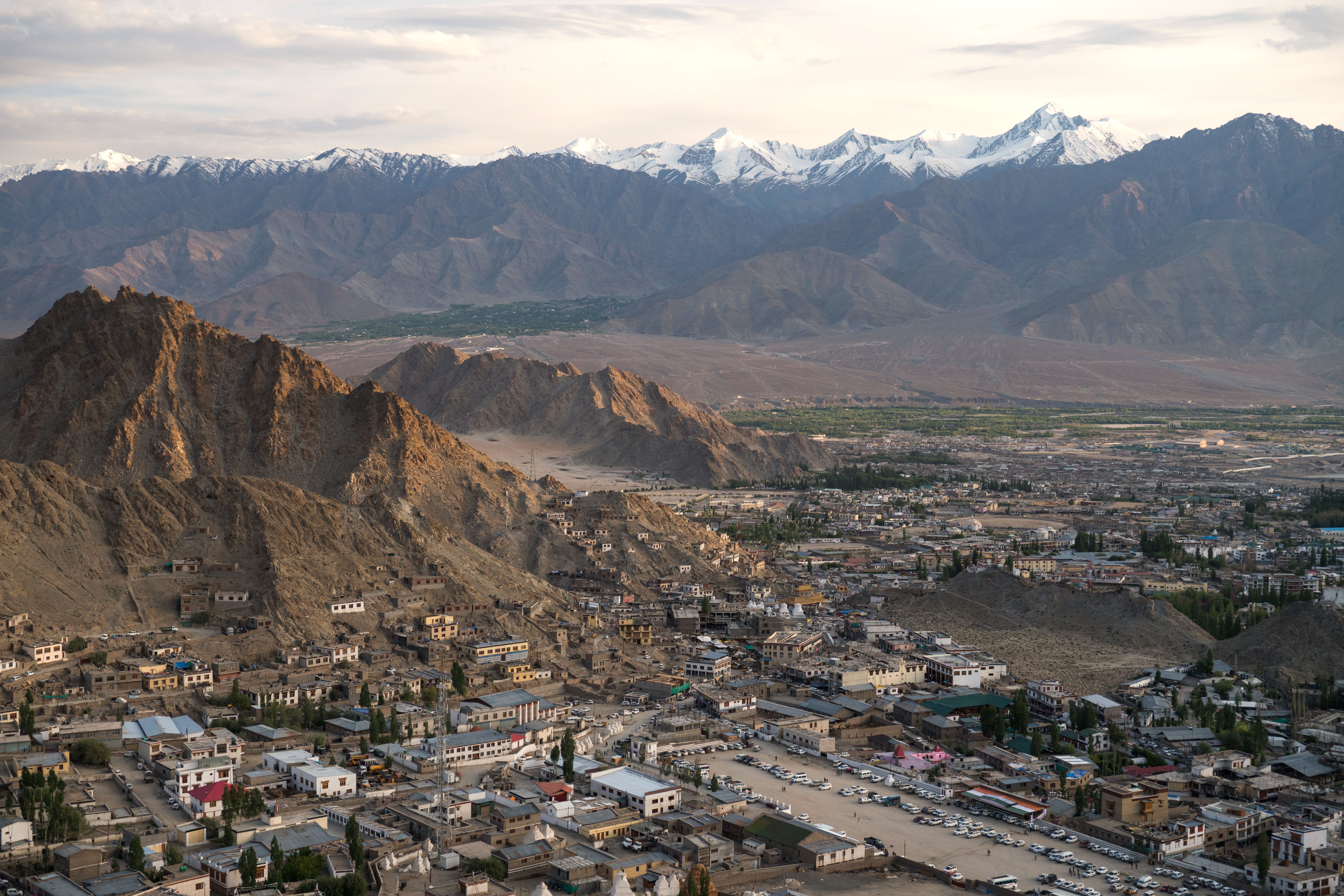 Leh town beneath snow-capped Himalayan peaks