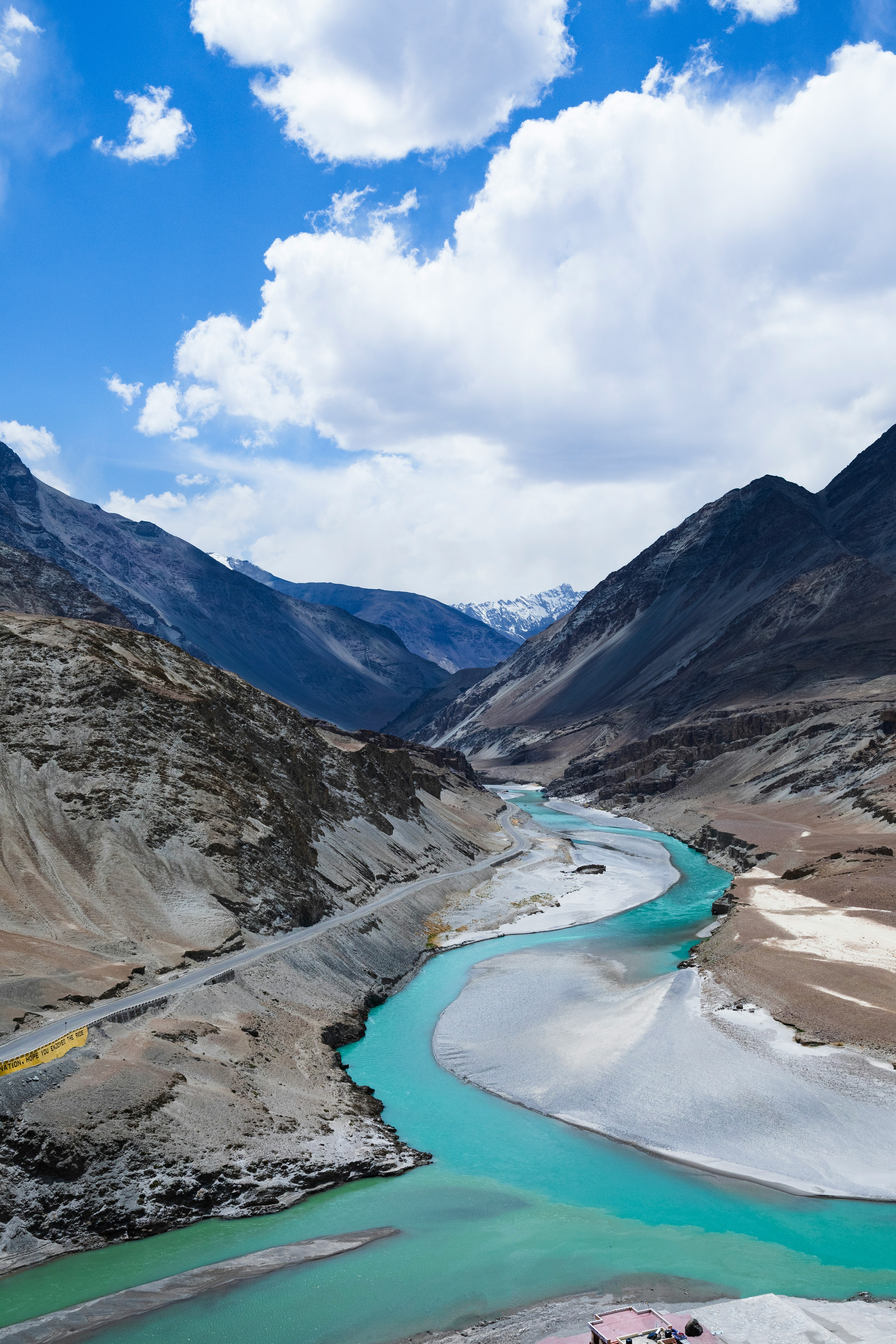 Turquoise Indus and Zanskar rivers meeting in a rocky Ladakh valley