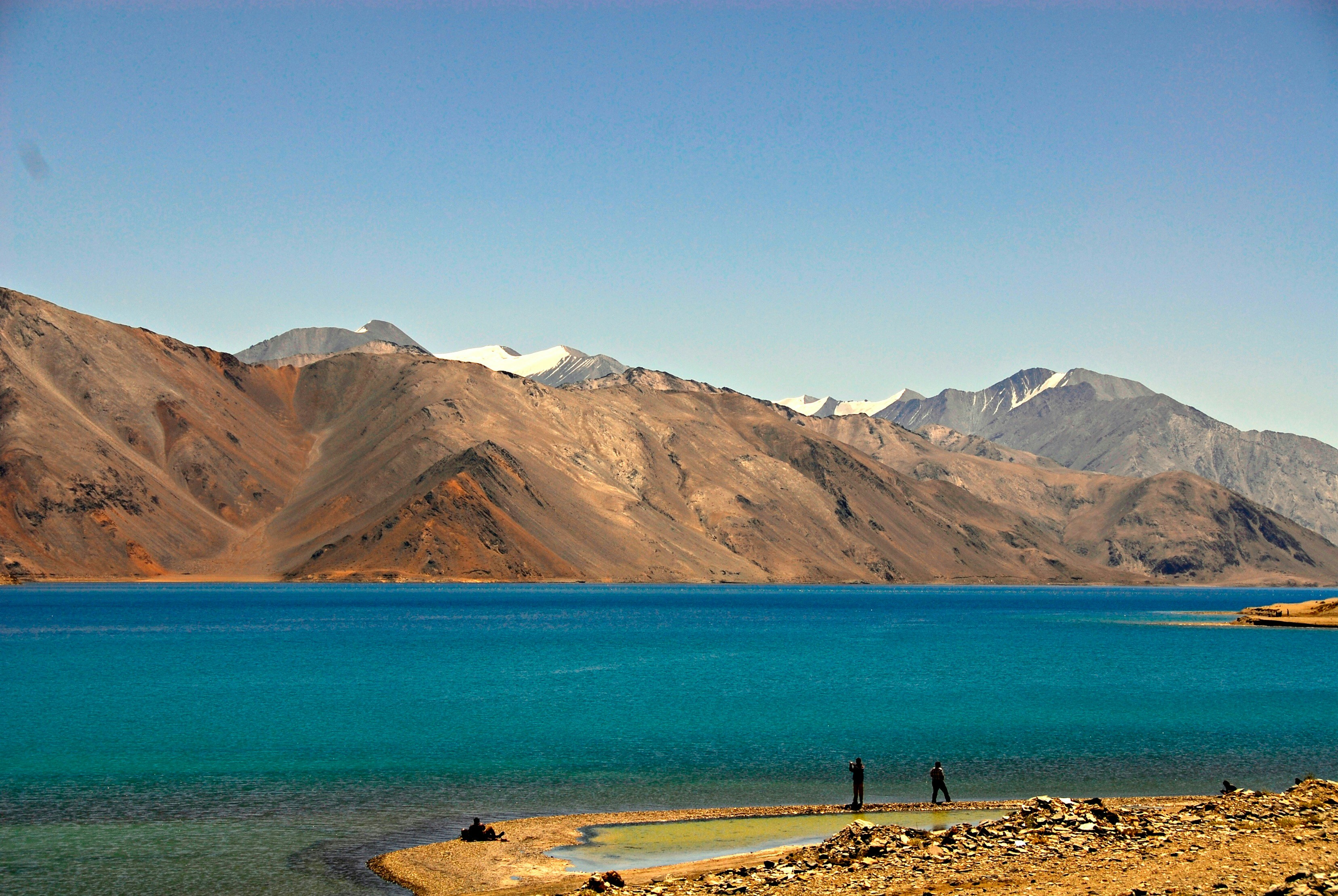Pangong Lake’s blue water beneath barren Himalayan mountains